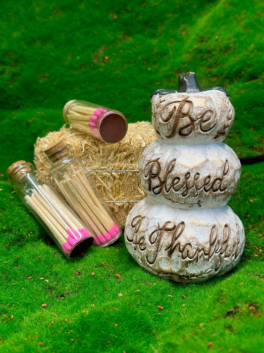 Matches in a bottle with a striker on the bottom are a clever and convenient way to store and ignite matches. The design  involves a glass bottle containing a quantity of matches with their heads facing downward, and a rough striking surface located on the bottom exterior of the bottle. 